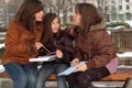 Mother teaching her daughters