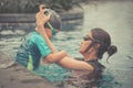 Mother teaching her son to swim Royalty Free Stock Photo