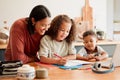 Mother teaching, learning and education with child studying, doing homework or writing in book during an at home lesson Royalty Free Stock Photo