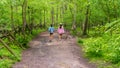 Mother and teen daughter walking down path Royalty Free Stock Photo