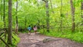 Mother and teen daughter walking down path Royalty Free Stock Photo