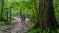 Mother and teen daughter walking down path Royalty Free Stock Photo