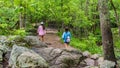 Mother and teen daughter walking down path Royalty Free Stock Photo