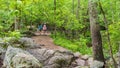 Mother and teen daughter walking down path Royalty Free Stock Photo