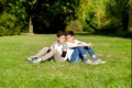 Mother and teenage children in walking the park