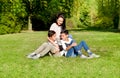 Mother and teenage children in walking the park