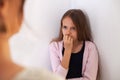 Mother and teenage daughter having a confrontation - young girl looking worried Royalty Free Stock Photo