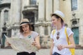 Mother with teenage daughter travel, women with map
