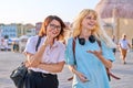 Mother and teenage daughter are walking together in the city Royalty Free Stock Photo