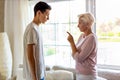 Mother and teenage son arguing at home Royalty Free Stock Photo