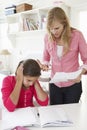 Mother Telling Daughter Off For Bad School Report Royalty Free Stock Photo