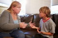 Mother Telling Off Son At Home