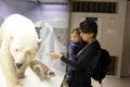 Mother tells her son about polar bear