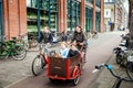 Mother with three children on the bicycle in Amsterdam, Netherlands