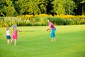 Mother throwing frisbee Royalty Free Stock Photo