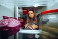Pregnant Woman Looking in the Frige Feeling Hungry Royalty Free Stock Photo