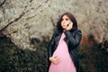 Worried Pregnant Woman Talking on the Phone Royalty Free Stock Photo