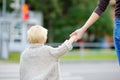 Mother and toddler crossing the street on the crosswalk Royalty Free Stock Photo