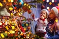 Mother with toddler son boy near Christmas tree Royalty Free Stock Photo