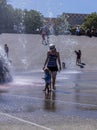 Mother and Toddler on a sunny day at Play in Seattle Fountain Royalty Free Stock Photo