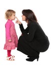 Mother touchs daughter's nose Royalty Free Stock Photo