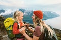 Mother traveling with daughter child family happy laughing together outdoor hiking in Norway healthy lifestyle Royalty Free Stock Photo