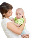 Mother trying to calm her crying baby isolated Royalty Free Stock Photo