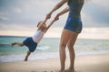 Mom and baby playing near beach. Traveling with family, child Royalty Free Stock Photo