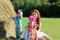 Mother with twins in field