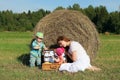 Mother with twins in field