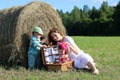 Mother with twins in field