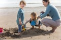 Mother and Two Children on the Beach
