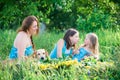 Mother, two daughters and dog Royalty Free Stock Photo