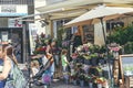 A mother with two kids buying flowers on a street in London Royalty Free Stock Photo