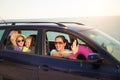 Mother with two kids travel by car on sea vacation Royalty Free Stock Photo