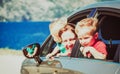 Mother with two kids travel by car on sea vacation Royalty Free Stock Photo