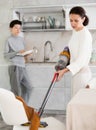 Mother and son doing household chores Royalty Free Stock Photo