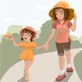 Mother walks with her daughter in the park