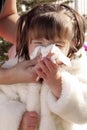 Mother Wiping Sick Toddlers Nose