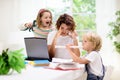 Mother working from home with kids. Quarantine Royalty Free Stock Photo