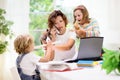 Mother working from home with kids. Quarantine Royalty Free Stock Photo