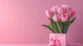 Mother's Day decorations concept. Top view photo of trendy gift boxes with ribbon bows and tulips on isolated pastel Royalty Free Stock Photo