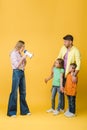 Mother yelling into megaphone on confused kids and husband on yellow