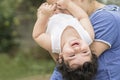 Mother and young child playing together in outdoor environment