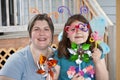 Mother and young daughter crafting and creating with pipe cleaners Royalty Free Stock Photo