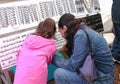 Mother and Young Daughter Selecting Jewelry at Fair Royalty Free Stock Photo