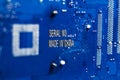 . motherboard. color blue. there are scratches on it. Caption Made in China Royalty Free Stock Photo