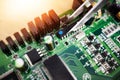 Motherboard, microchip tweezer and engineering closeup with electric maintenance of circuit board. Developer, IT and