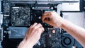 Motherboard service. Technology hardware repair and electronic computer maintenance from technician engineer man Royalty Free Stock Photo