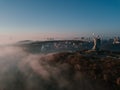 The Motherland Monument. Kiev Ukrainian capital popular tourist places to visit. Aeriel drone photo from the top. Foggy